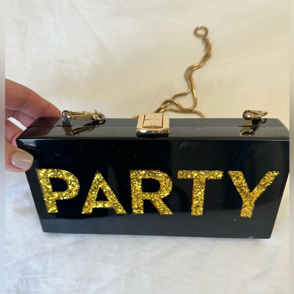 Clutch by Milly. Black lucite